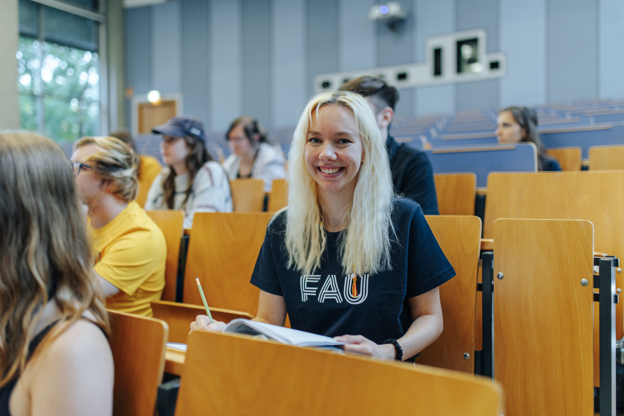 Studentin im Hörsaal